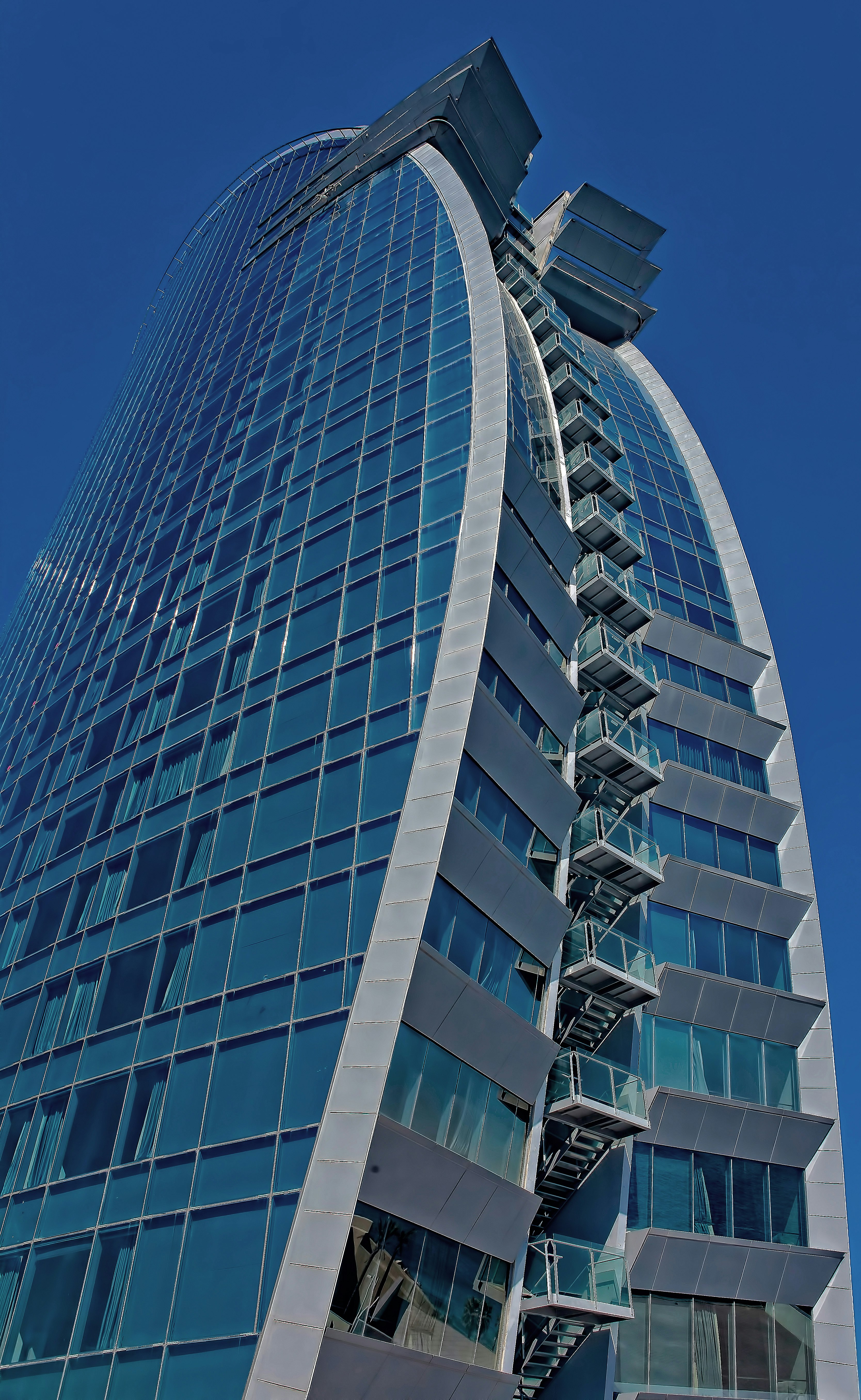 white and blue high-rise building